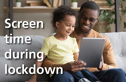 A parent and child looking at a tablet computer