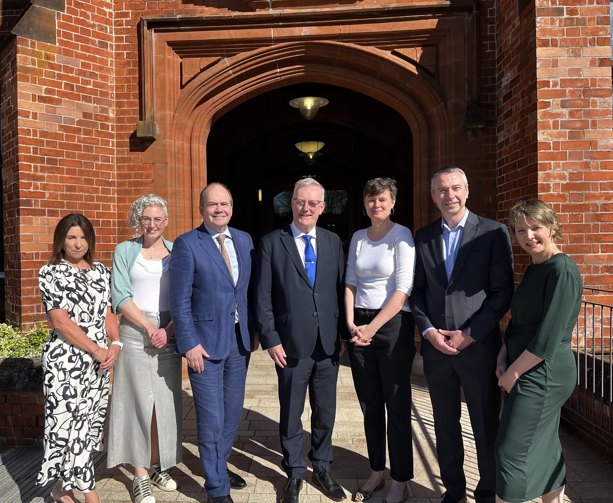 (L–R) Emily Roberts, PHA; Dr Hannah McCourt, PHA; Dr Michael McBride, Chief Medical Officer; Mike Nesbitt, Minister for Health; Laura Lamming, NIHR PHIRST; Dr Gavin Breslin, QUB; Professor Katherine Brown, NIHR PHIRST.