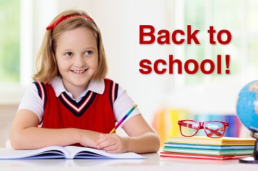 Young girl in school uniform