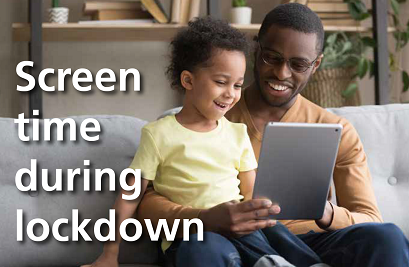 Parent and child looking at a tablet computer