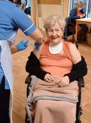 Bernadette Coleman receiving her vaccination 