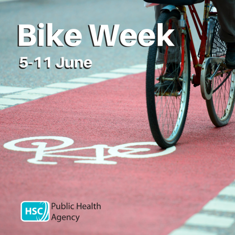 Bike Week 5-122 June - a person on a bike on a red bike lane