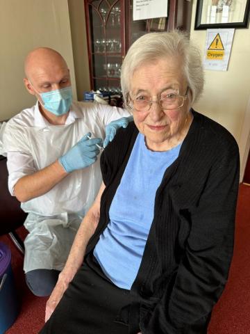 Pictured (L-R) Pharmacist Paul McGimpsey with Rose Davey, resident at Karingmore Residential Home, Carnlough.