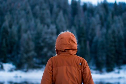a person looking into the distance winter weather