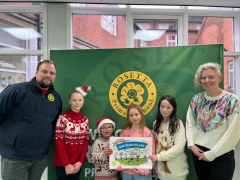 (L-R) Mr McGarrigle, pupils and  Dr Hannah McCourt, PHA