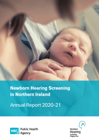 Newborn baby in the arms of a woman