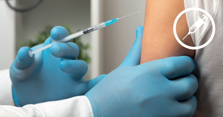A person receiving a vaccine injection