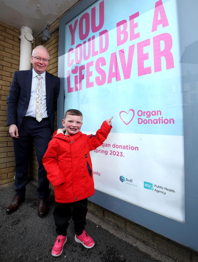 Chief Executive of the PHA Aidan Dawson with 5-year-old organ donation campaigner Dáithí Mac Gabhann at the campaign launch