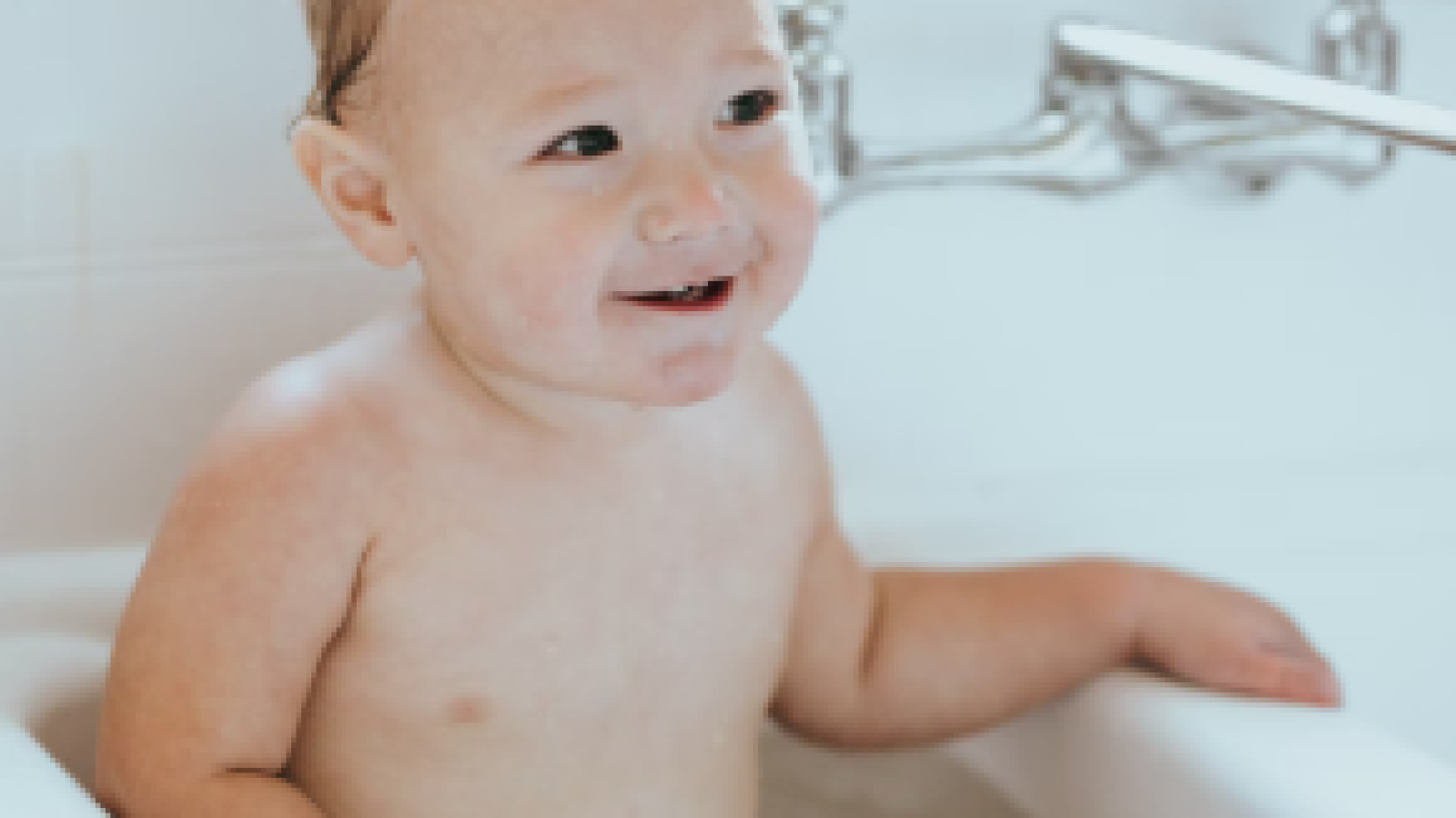 baby in a bathtub, sink