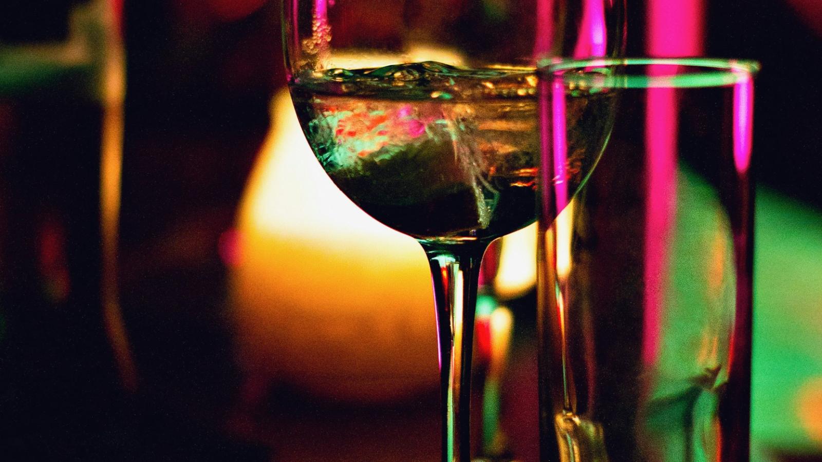 wine and cocktail glasses, festive background
