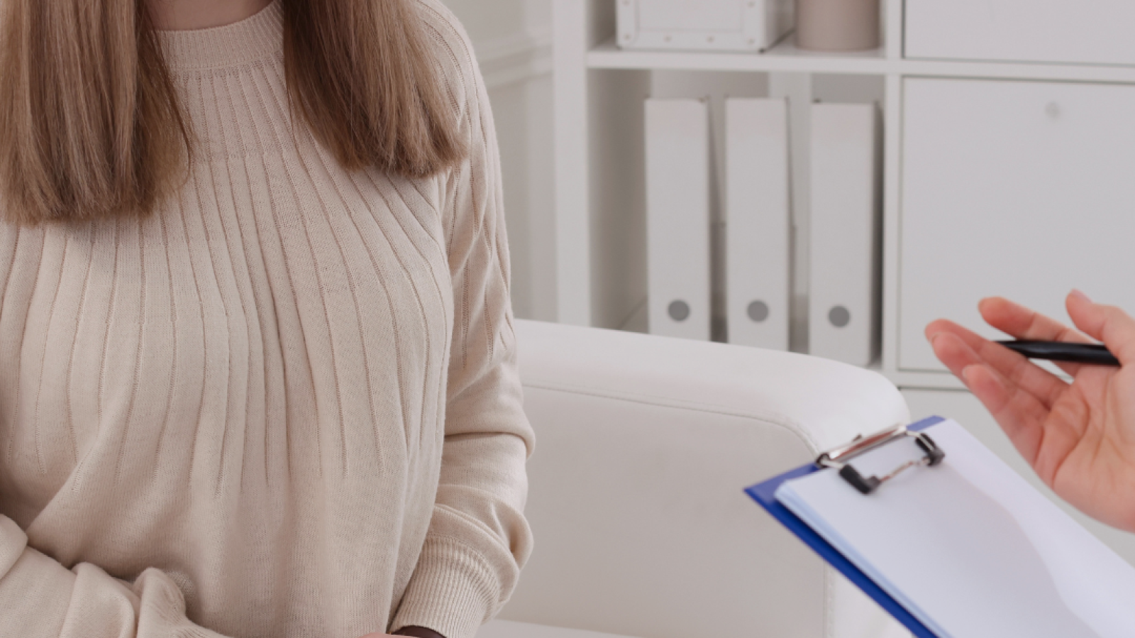 Image of a woman talking to a doctor