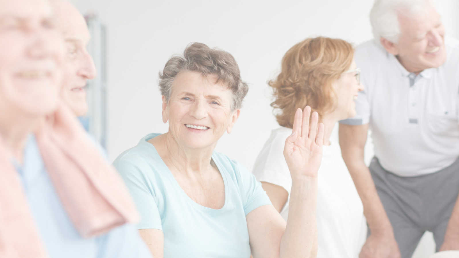 Photograph of older people smiling and laughing together, to promote positive aging month.
