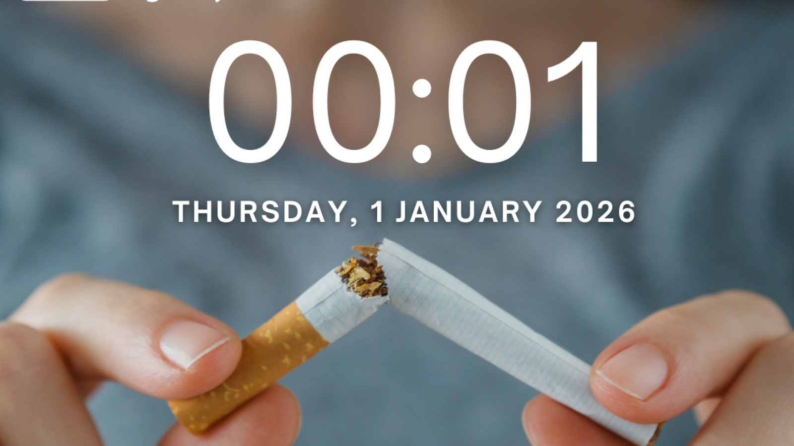 Photograph of someone breaking a cigarette to symbolise quitting smoking with text saying Thursday 1 Jan 2026, reminder to set a new years resolution to quit smoking.
