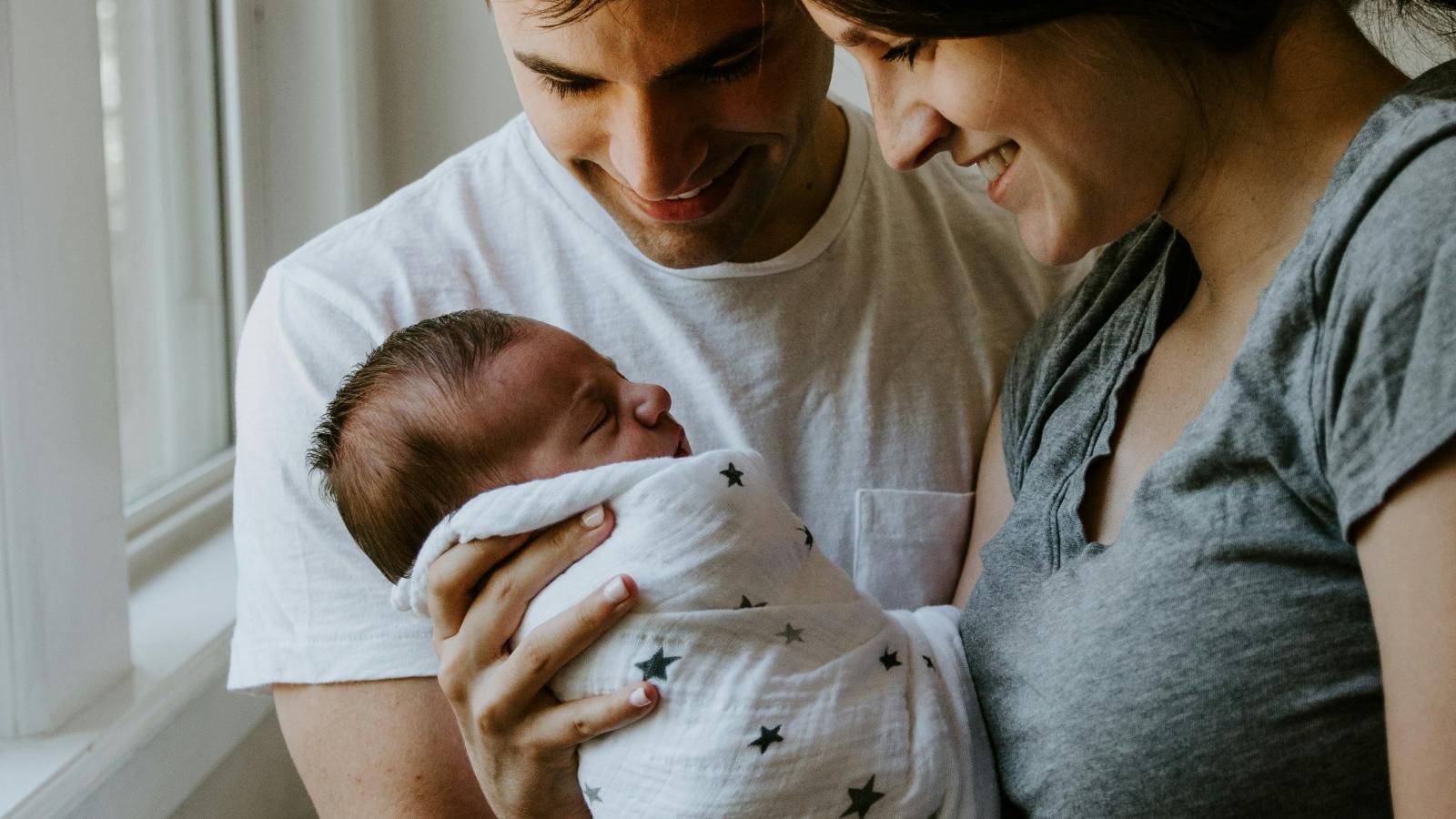 Couple with new baby