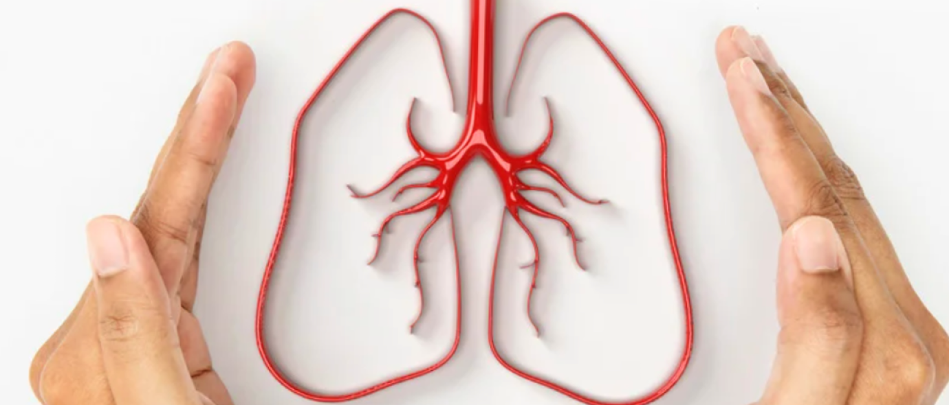 hands hovering over image of lungs