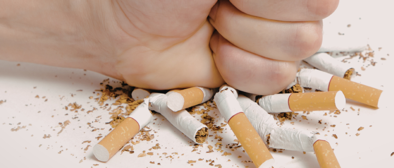 no smoking campaign - hand crushing cigarettes